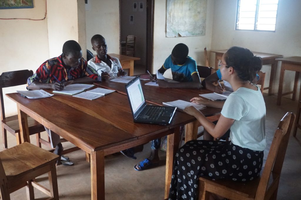 DukeEngage student teaching a writing class in Togo