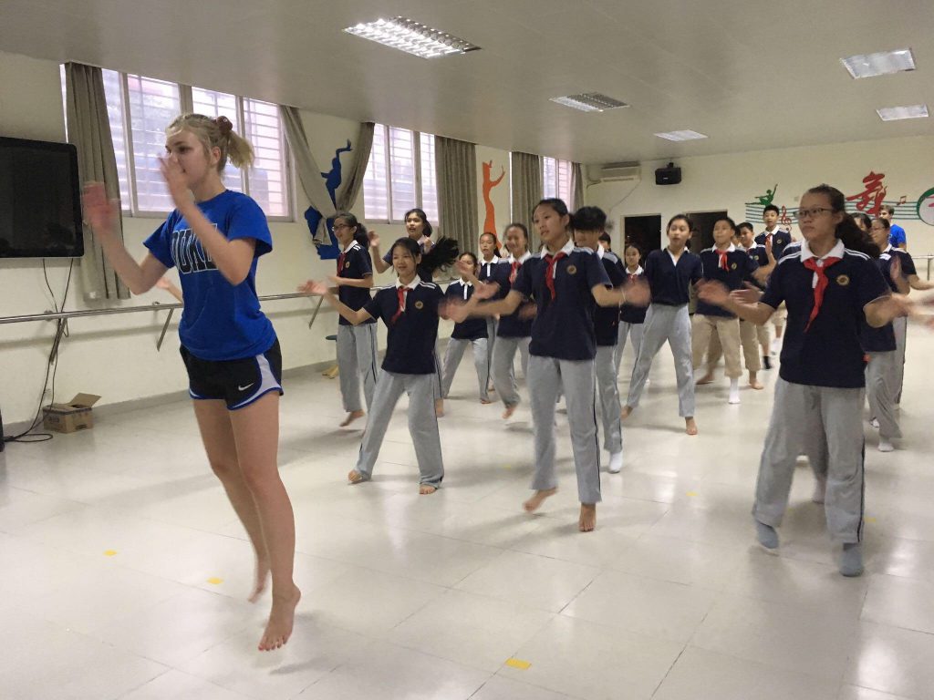 DukeEngage student leading a dance class