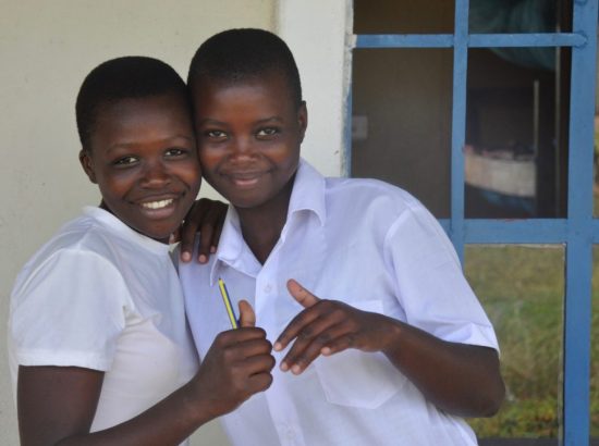 two young women in white shirts