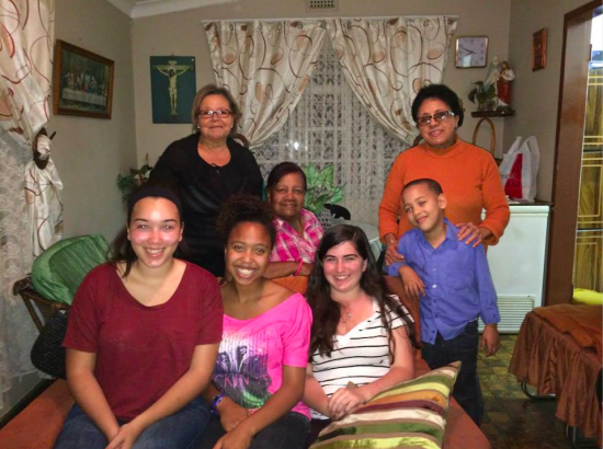 DukeEngage students with host family in Africa