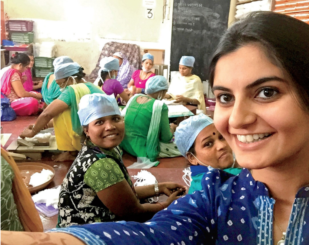 Girl taking selfie with women in classroom in India