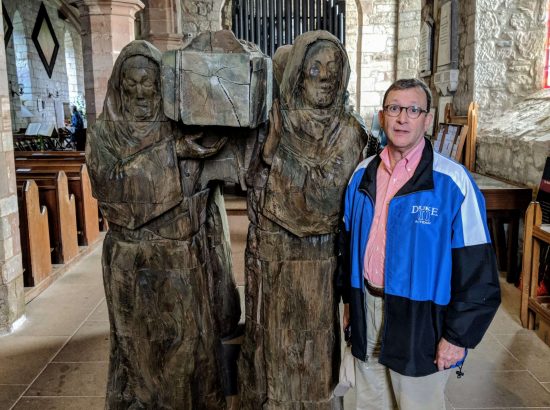 Sam Miglarese with The Journey sculpture, by Fenwick Lawson. You can also find a bronze sculpture of St. Cuthbert's "Journey" in Millennium Park, Durham, UK.