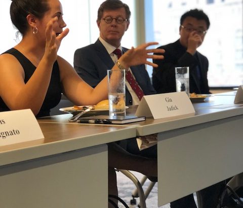 people talking and eating