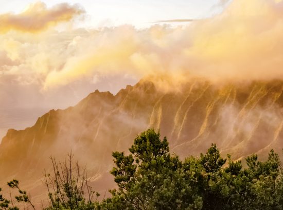 cloudy view of mountains at sunrise