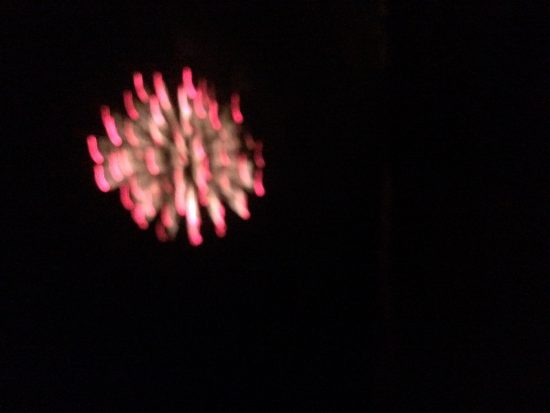 A blurry image of a red firework