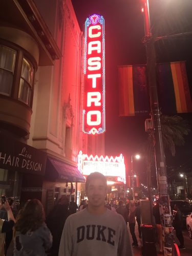 Duke student standing in front of historic Castro Theater