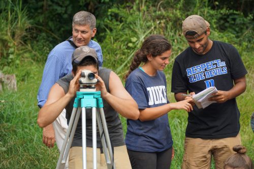 David Schaad and 3 DukeEngage Students out in the field