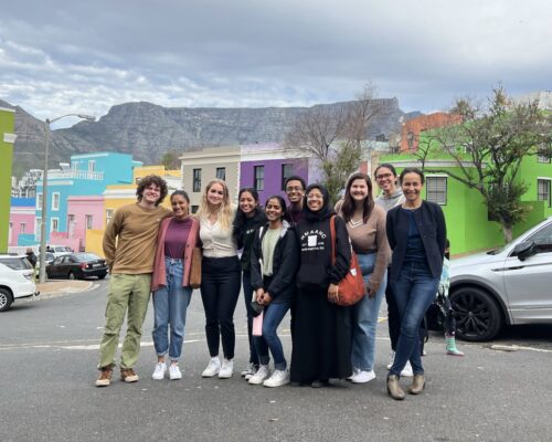 The 2022 DukeEngage Cape Town cohort in the city’s Bo-Kaap district, an area formerly comprised of slave quarters and today is a hub of Cape Malay culture.