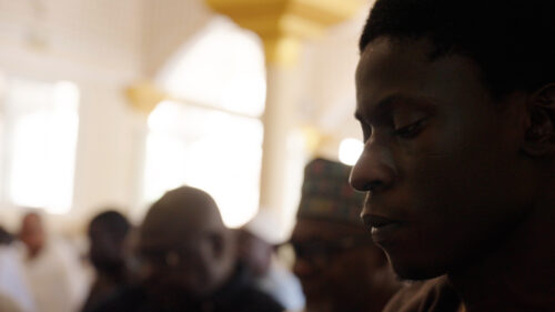 A man looking intent in a mosque